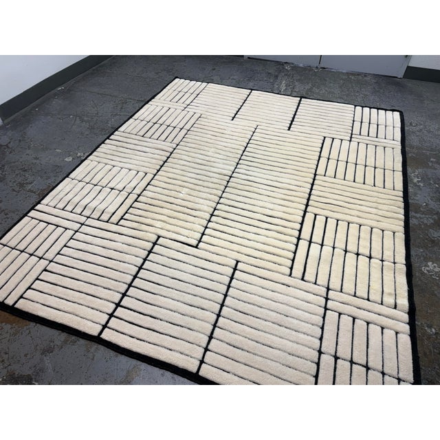 Design Plus Gallery presents a 8ft 4in x 9ft 9in Lalita Area Rug from The Citizenry. The rug has a high-texture, geometric...