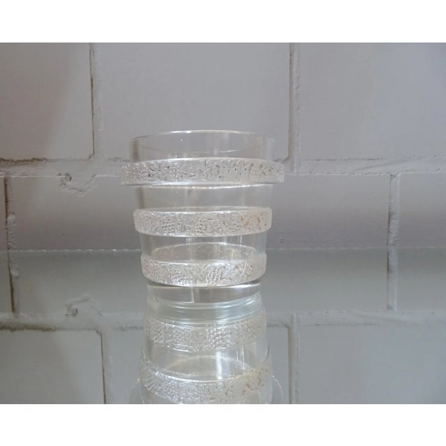 - Rare Art Deco vase by Lalique - Thick-walled pressed glass with vines adorned - From the 1930s This piece has an...