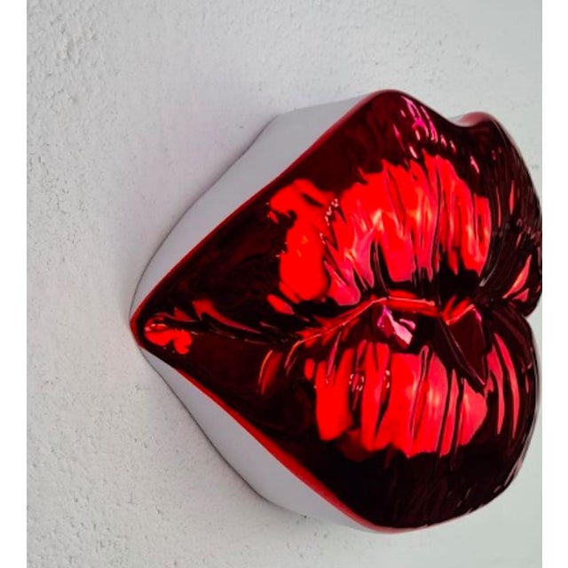 Sagrasse Kiss Red Resin and marble powder 30x33x3cm Edition of 100 Sign Numbered This piece is attributed to the mentioned...