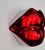 Sagrasse Kiss Red Resin and marble powder 30x33x3cm Edition of 100 Sign Numbered This piece is attributed to the mentioned...