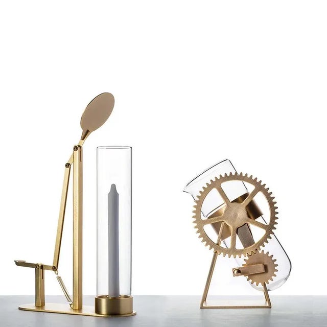 DEUS is a couple of objects turned into machines by 4P1B. The brass structure is actually a mechanism that allows the...