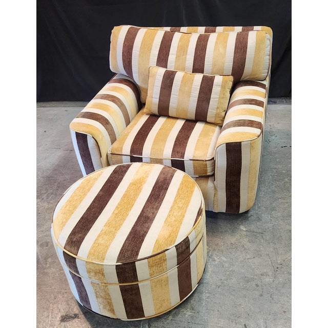 Beautiful custom made striped club chair with matching round ottoman. Chair is 37" wide x 38" deep x 28" tall Ottoman is...