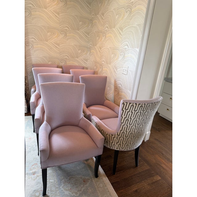 Cheerful dining chairs upholstered in lavender wool on inside and slate blue and light gray greek key patterned fabric on...