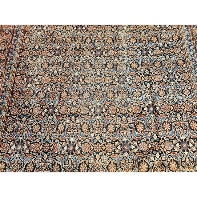 An antique Persian Tabriz rug of exceptional beauty, this handwoven masterpiece from the first quarter of the 20th century...
