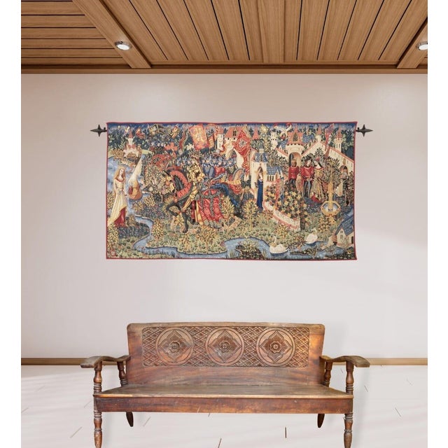 A Medieval Renaissance tapestry depicting the legend of King Arthur. The tapestry reads from right to left. First, Arthur...