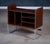 Iconic Danish media console from Bang & Olufsen, crafted in rich rosewood with aluminum edges and frame. Featuring elegant...