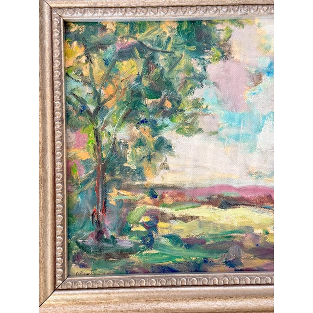 Vibrant landscape painting using a wide range of colors, making this piece come alive. The work captures the vibrancy of a...