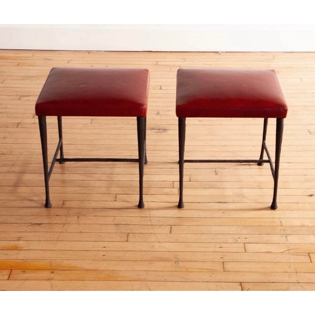 Christian Liaigre for Holly Hunt square red leather "Sudd" stools. The stools are upholstered in Holly Hunt leather with...