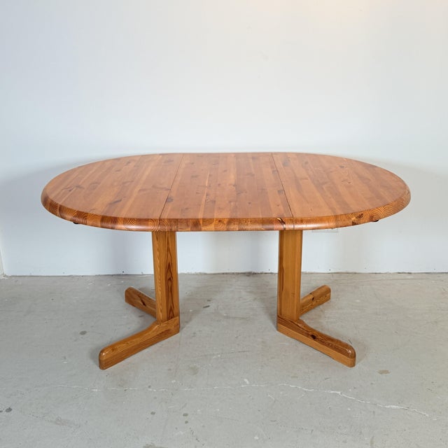 Extendable solid pine dining table extension. Presumably produced by the Danish company Korup, designed by Rainer...