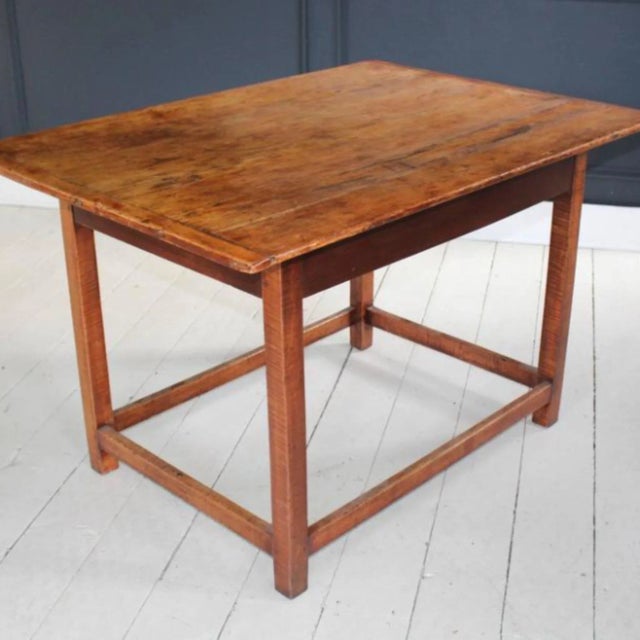 White pine two-board table, 18th century Pennsylvania, with bread board ends and stretcher base.