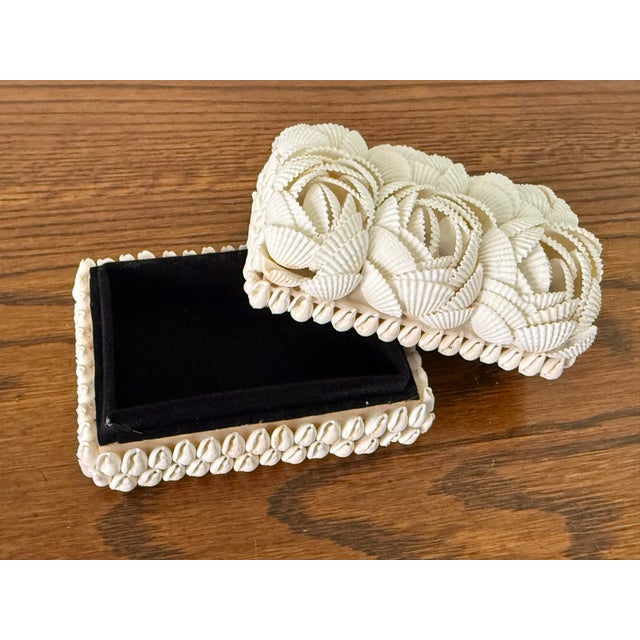 Pure white Coastal trinket box covered in rosettes formed by scallop shells. Inner lining is black velvet. Please see...
