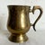 This vintage engraved brass cup/mug is a beautiful blend of functionality and old-world charm. Adorned with intricate...