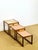A lovely set of three nesting tables in a scandinavian design typical of the 1960s. the solid teak frame features clean,...