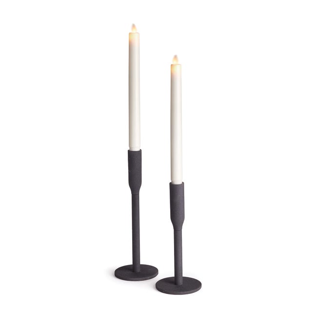 Forged metal, sleek in design. The Killian Taper candleholder is made for the modern home. Pairs perfectly with our...