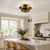 Bring timeless elegance and modern simplicity into your home with this handcrafted antique brass flush mount ceiling light...