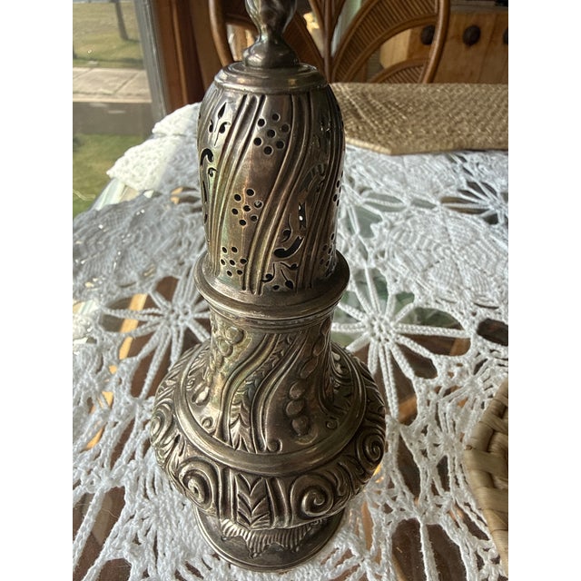 Add a touch of timeless English elegance to your table with this stunning antique sterling silver sugar castor with...