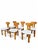A set of four Scandinavian pine dining chairs dating from the 1970s, combining simple construction with the warm organic...