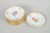 Rosenthal set of twelve plates. Elegant set of twelve porcelain plates with polychrome floral decoration and gilded rim,...