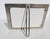 Satin Steel Photo frames with a back-stand. marked Wingard San Francisco. Glass faced with dimensions of 9" by 7",...