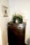 This impressive, solid wood tallboy stands at a commanding height of 48", offering significant storage and a powerful...