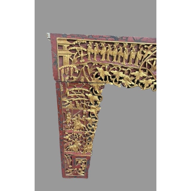 Antique Oriental carved and gilded painted wood panel, intricately carved and pierced with figures, horses, branches, and...