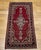 "A timeless vintage Persian Kashan area rug from the third quarter of the 20th century featuring a refined floral...