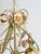 Vintage painted tole chandelier featuring a four-light cage form decorated with hand-shaped flowers, leaves, and botanical...