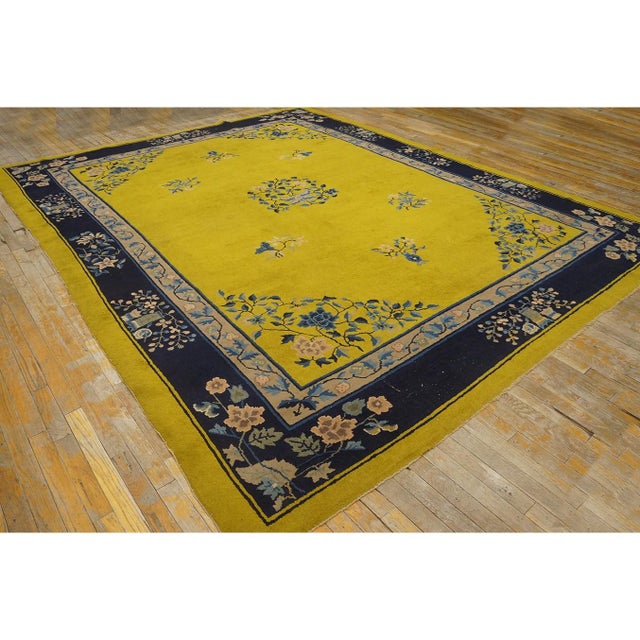 Antique Chinese Peking rug, size: 9'0" x 11'6". Antique Peking Chinese Floral Medallion Yellow 1920s Rug, Circa Date:...