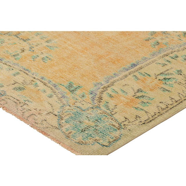 Vintage Zeki Müren Rug in Orange Open Field With Floral Medallion | Rug & Kilim For Sale In New York - Image 6 of 7