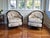 A lovely pair of vintage Thomasville Art Deco-style lounge chairs. Features a stylish curved back and loose seat cushion...
