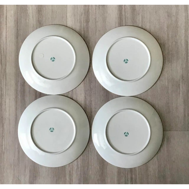 Beautiful set/4 vintage German pheasant / wildlife plates with gilt rim. Each plate features a different design. Marked...