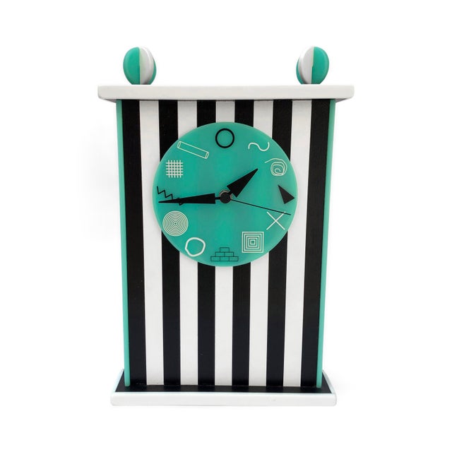 An exceptional architectural desk clock with bold postmodern spirit, "YOU SPIN ME ROUND" by Kim Mullis as Wilderness...