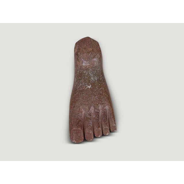 "A beautiful foot sculpture from Bali. Hand carved in solid river rock polished and stained. Great as an art object or a...