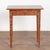 This delightful pine side table comes from the Swedish countryside and still maintains the original faux wood painted...