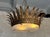 This unique large crown ceiling fixture features three rows of elegantly stylized leaf or feather rays that is not only...