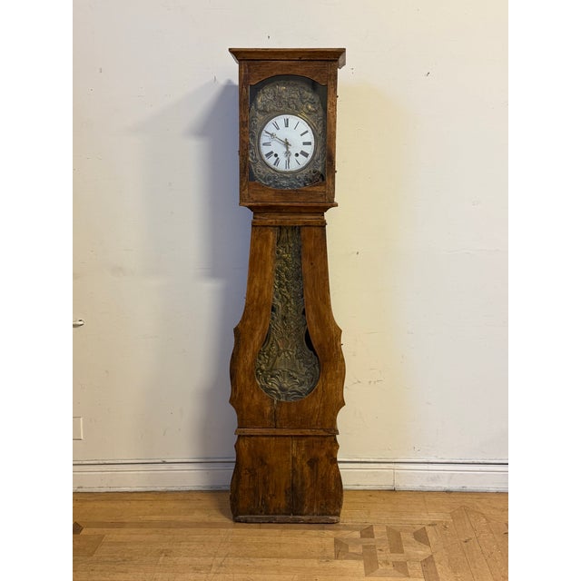 Design Plus Gallery presents a French Morbier Clock from the 19th Century. The tall wooden case showcases hand-shaped...