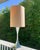 Large Space Age lamp (1m tall). Very nice chrome finish. High-quality workmanship. Unfortunately, the shade has a stain....