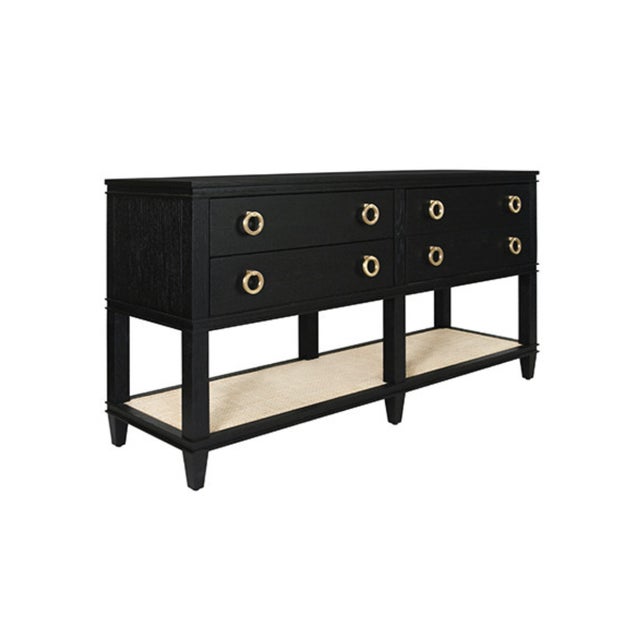 New special order item. Not vintage. The Richmond black oak, four drawer console with caned shelf is an elegant and...