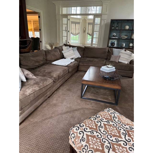 Transitional classic club chair and ottoman with sophisticated pattern in area, camel and black. the phot looks more...
