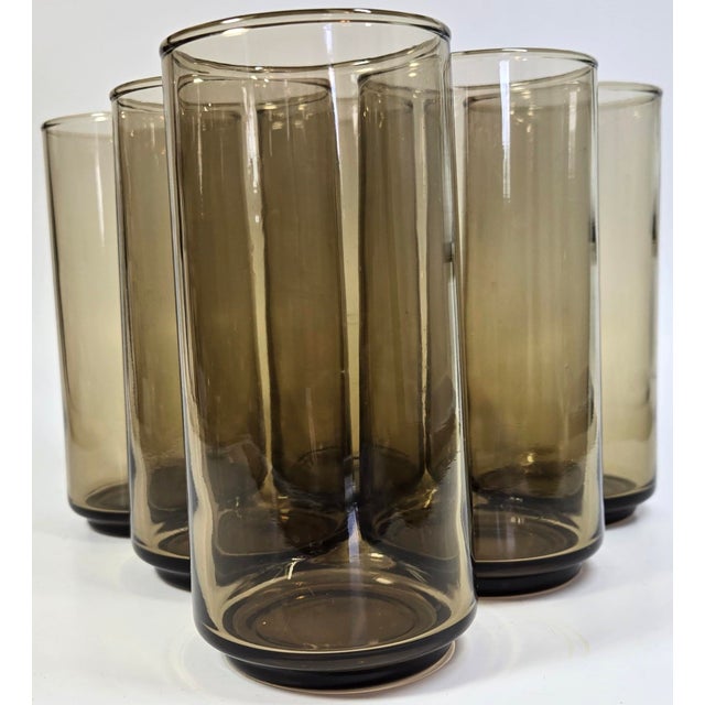 This is the ultimate 60-70s glassware. A bit of Danish modern in the design, the smoky brown in just the perfect shade and...