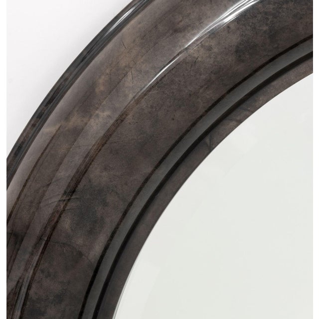 Karl Springer Style Goatskin Circular Mirror, the beveled glass mirror surrounded by lacquered gray goatskin frame. Mirror...