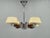 Beautiful Art Deco chandelier produced in Czechoslovakia during the 1930s. This refined ceiling light features a...