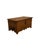 This 19th-century walnut chest, a rustic antique with a powerful presence, stands out for its distinctive fratinatura...