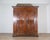 A stately 18th-century Italian wardrobe, handcrafted in solid poplar and dated 1751, as inscribed across the upper frieze....