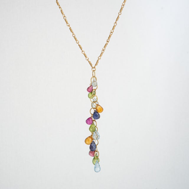 Stylish and finely detailed pre-owned Tiffany & Co multi gemstone drop necklace crafted in 18k yellow gold (circa early...