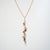 Stylish and finely detailed pre-owned Tiffany & Co multi gemstone drop necklace crafted in 18k yellow gold (circa early...