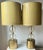 This fabulous pair of large Arteriors Home Gold lamps feature Gold seeded hand-blown glass globes, metal bases and raw...