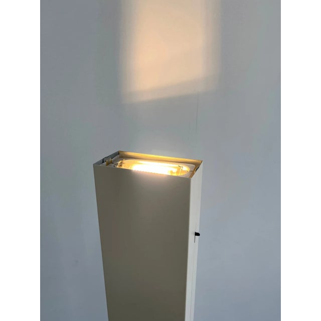 W11 D7 H73 Vintage post modern floor lamps in great vintage condition with no major areas of wear. Each unit is...