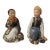 Pair of Early 1900s Royal Copenhagen Carl Martin-Henson Figurines of a Boy and Girl For Sale