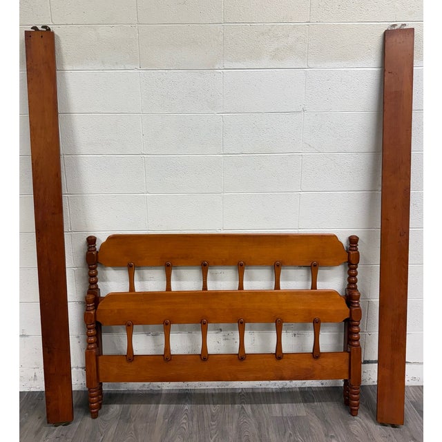 This is a beautiful vintage Early American Colonial style full sized maple spindle low poster bed. It features gorgeous...